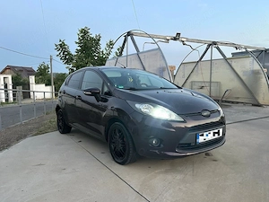 Ford Fiesta 2009, motor 1.6 TDCi 90 cai - imagine 6