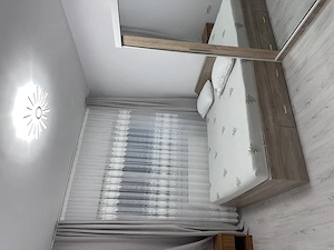 Închiriez apartament cu 2 camere
