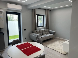 Apartament 2 doua camere si curte de inchiriat Otopeni odai prima inchiriere - imagine 3
