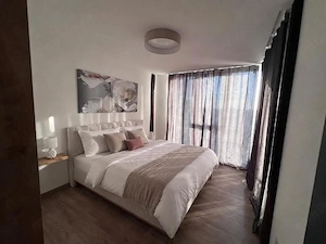 Inchiriez apartament central, parcare inclusa, dotari premium, prima inchiriere - imagine 4