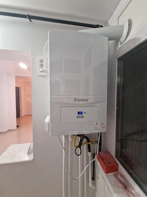 Persoană fizică: 3 camere decomandat, 73 mp utili, renovat total de la zero (instalații noi,izolat) - imagine 8