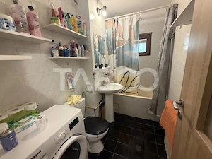 Apartament decomandat 80 mpu 3 camere 2 bai etaj 2 zona 1 Decembrie - imagine 8