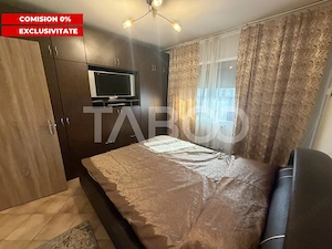 Apartament decomandat 80 mpu 3 camere 2 bai etaj 2 zona 1 Decembrie