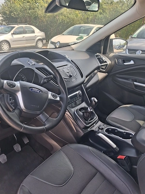 Ford Huga Benzinar - imagine 8
