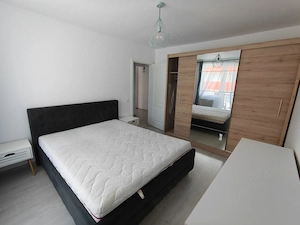 Închiriez apartament spațios și luminos, situat la etaj 4 într-un imobil construit recent - imagine 4