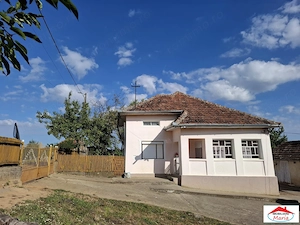 Casa cu teren si gospodarie in Cuta- Socond 29000 Euro