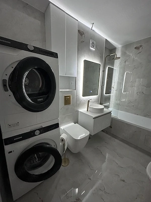 De vanzare apartament 2 camere cu finisaje de calitate + parcare subterană inclusă - imagine 3