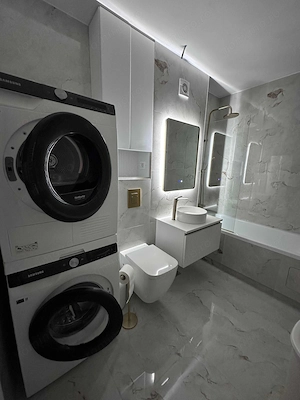 De vanzare apartament 2 camere cu finisaje de calitate + parcare subterană inclusă - imagine 3