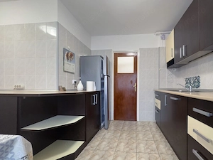 Apartament Nerva Traian, Unirii bloc 2002 - imagine 4