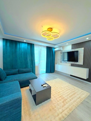 LA CHEIE: Apartament 3 camere, etaj 2, renovat, design premium - imagine 2