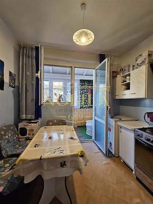 Apartament cu GRADINA SI ACOPERIS  MANSARDA DE VANZARE IN ONESTI ETJ 1