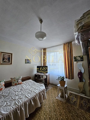 Apartament cu GRADINA SI ACOPERIS  MANSARDA DE VANZARE IN ONESTI ETJ 1 - imagine 8
