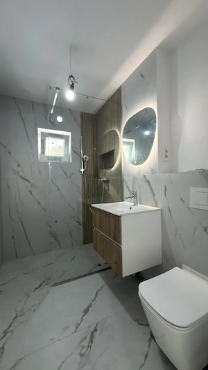 Apartament 3 camere, 2 bai, etaj 1 decomandat, 65 mp utili - Dambovita - imagine 6