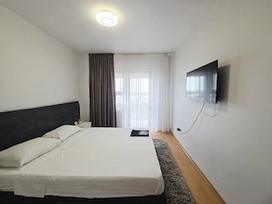 2 camere BLOC NOU 71 mp etaj intermediar vedere catre Dunare mobilat - imagine 9
