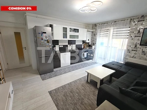 Apartament decomantat 3 camere 2 bai 70 mp utili cu parcare subterana