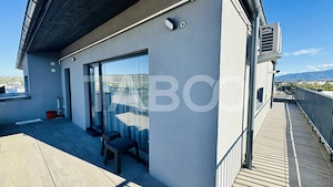 Apartament tip penthouse de vanzare 3 camere 2 bai - terasa mare - imagine 2