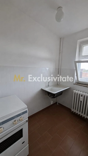 Garsoniera Craiovei etaj intermediar in bloc de apartamente - imagine 5