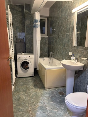 Ofer spre închiriere apartament cu 2 camere - imagine 5