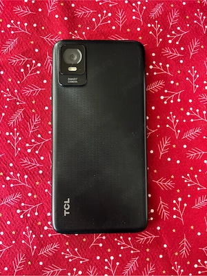 Vand telefonane TCL 403 