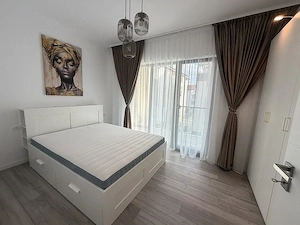 Închiriez apartament în bloc nou cu 2 camere - imagine 4