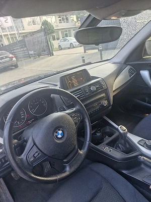 Vând BMW 116i TwinTurbo, an fabricație 2011, cu 152.000 km, culoare neagră, 4 uși și unic proprietar