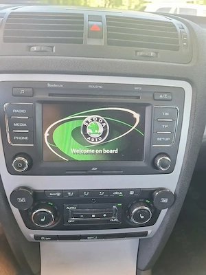 Se vinde Skoda octavia 2 facelift an 2011 diesel 1.6,105 cai,la  preț 4700  negociabil  - imagine 4