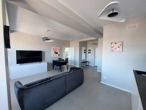 Se ofera spre inchiriere apartament cu doua camere in zona Titan - imagine 3