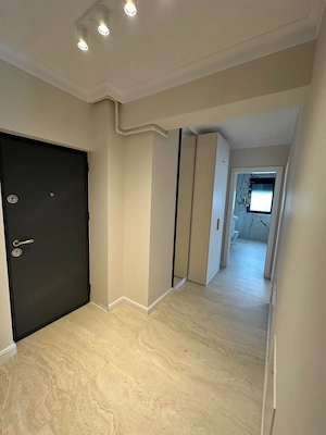 Apartment deosebit cu curte proprie se vinde complet mobilat - imagine 15
