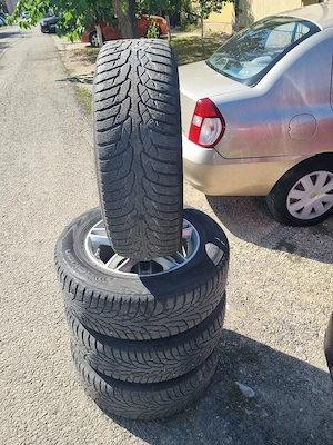 4 cauciucuri de iarna 215 65 16 cu jante de aliaj 5x114.3 de nissan si Duster - imagine 5