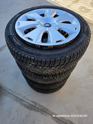 4 roți iarnă Ford R16 205/55 R16 Nankang 94V XL + jante SRD + capace Ford - imagine 4