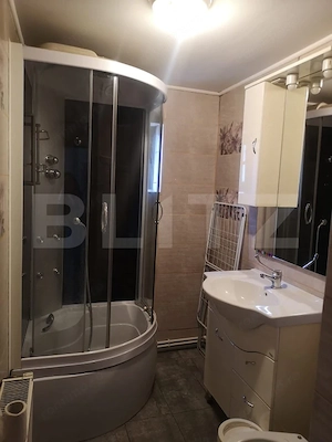 Apartament cu 2 camere, 55 mp, balcon închis și centrală proprie – mobilat - imagine 4