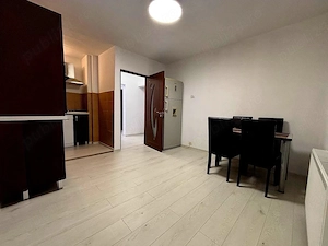 Se oferă spre închiriere un apartament spațios, luminos și complet mobilat și utilat, situat într-o  - imagine 8