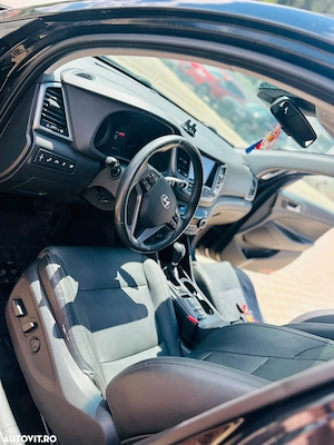 Hyundai Tucson 2.0 CRDI 4WD 6AT Luxury+ - imagine 4