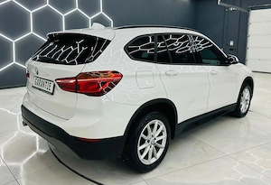 Bmw Seria X - imagine 4
