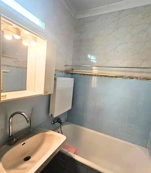 UN APARTAMENT PENTRU CEI CARE S-AU SĂTURAT DE SPAȚII ÎNGHESUITE - imagine 4