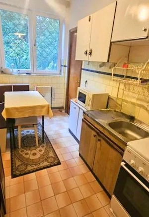 UN APARTAMENT PENTRU CEI CARE S-AU SĂTURAT DE SPAȚII ÎNGHESUITE - imagine 6