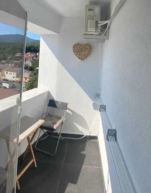Un apartament care bifează exact ce contează spațiu lumină liniște și parcare - imagine 2