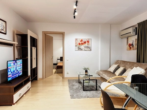 Închiriere Apartament 2 Camere   Zona Moinești (Gorjului   Valea Ialomiței), Parcare - imagine 7
