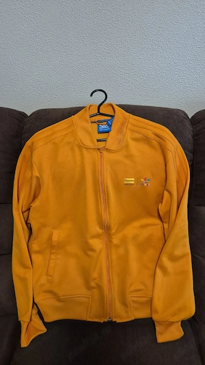 Bluză de trening originala Adidas colecția Pharrell Williams portocaliu ca noua