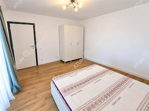 De inchiriat casa ultramoderna cu 4 camere 3 bai si dressing in Sibiu - imagine 19