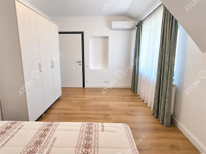 De inchiriat casa ultramoderna cu 4 camere 3 bai si dressing in Sibiu - imagine 18