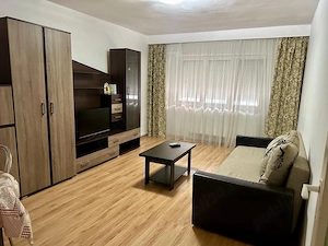 Închiriez apt 2 camere central 