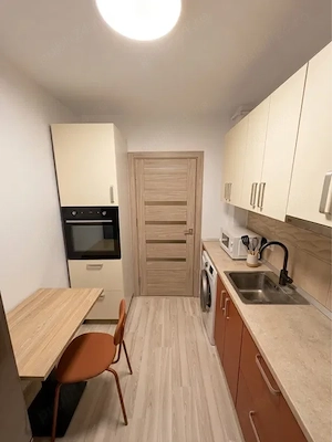 garsoniera ozana-centrala proprie-parcare proprie - imagine 4