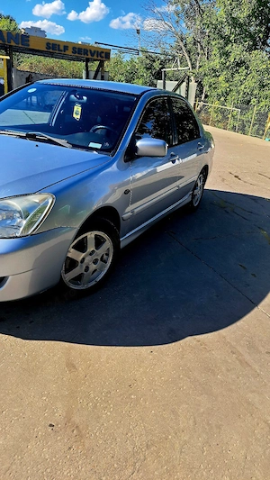 Vând Mitsubishi Lancer 2009 1.6 aspirat  - imagine 4