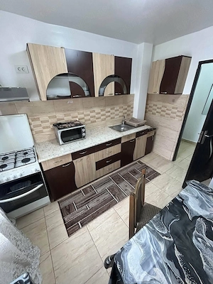 De inchiriat apartament cu 2 camere, spatios, cu balcon. 1200lei luna - imagine 3