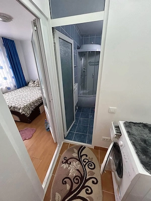 De inchiriat apartament cu 2 camere, spatios, cu balcon. 1200lei luna - imagine 8