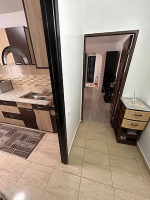 De inchiriat apartament cu 2 camere, spatios, cu balcon. 1200lei luna - imagine 5