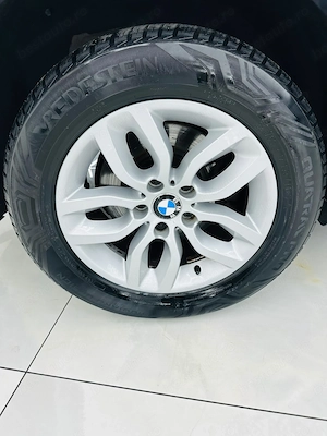 Bmw Seria X - imagine 9