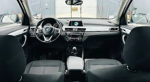 Bmw Seria X - imagine 6