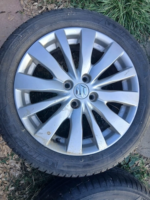 set jante suzuki R16 4x100 cu anvelope vara Michelin an 2016